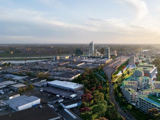 Een impressie vanuit de lucht gezien van de wijk Rijnpark. Een afwisseling van hoogbouw, laagbouw, woningen en veel groen.